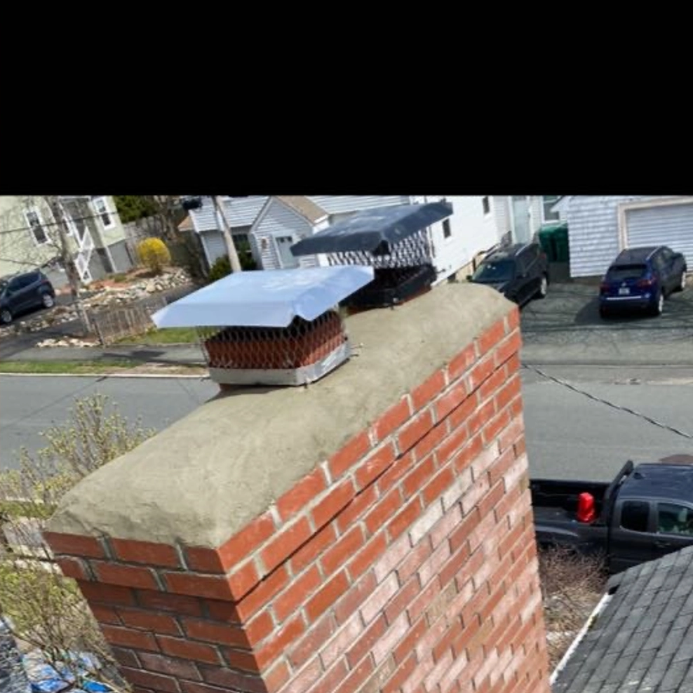 Chimney Rebuild for Boston Elite Roofing & Masonry in Boston, MA