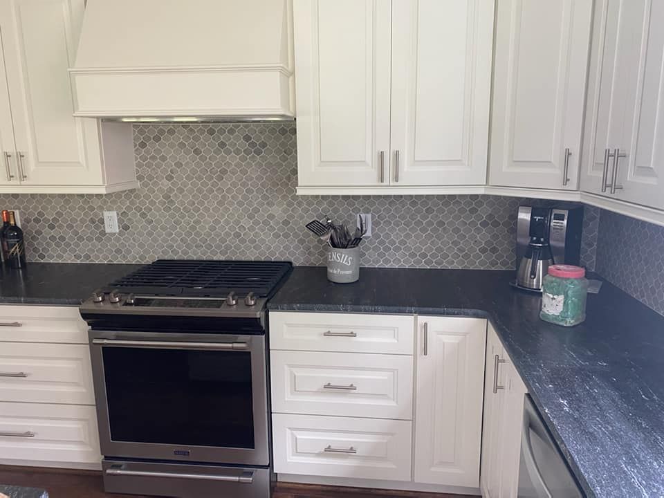 Enhance your kitchen's aesthetic with our expert backsplash tiling service, offering personalized designs and professional installation to complement any style. Transform your space effortlessly with precision and high-quality materials. for Thomas Tile and Stone LLC in North Chesterfield, VA