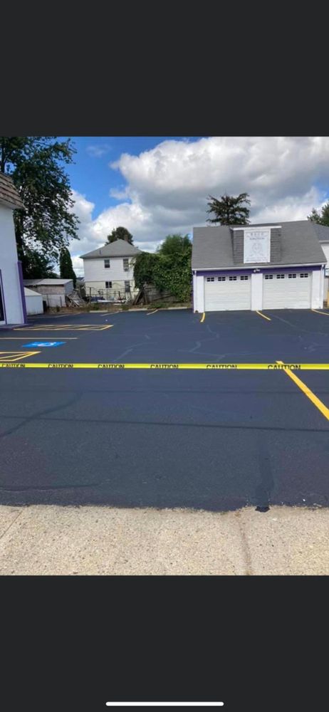 Our Commercial Parking Lots service offers durable, high-quality asphalt paving and sealcoating solutions for businesses looking to enhance the functionality and appearance of their parking areas. Trust us for reliable results! for Curb Appeal Asphalt Paving and Sealcoating  in Rhode Island, Rhode Island