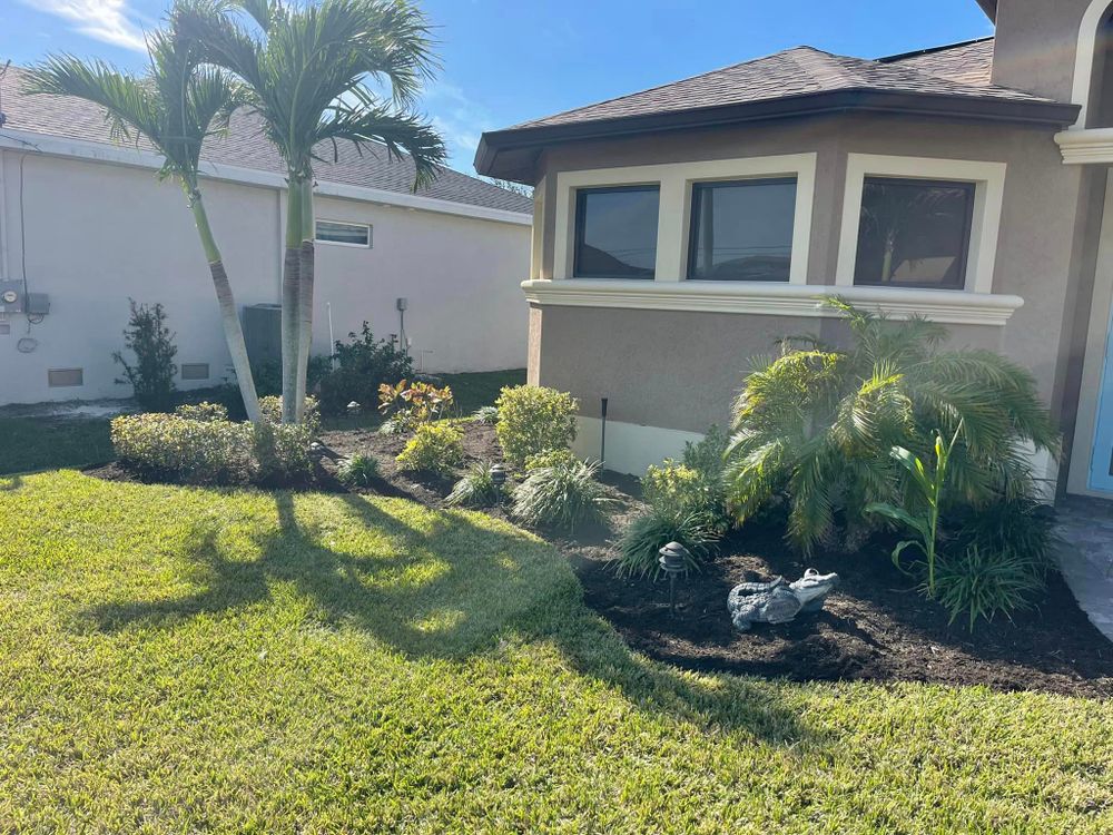 Enhance your outdoor space with our professional landscape installation service, featuring expert mulch installation for a beautiful and low-maintenance garden that complements your home's aesthetic. for Greystone Site Services in Fort Myers,, FL