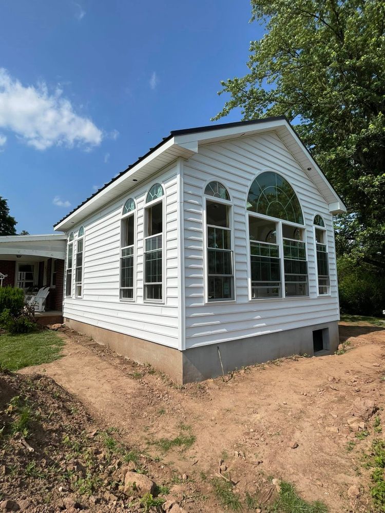 Enhance your home's curb appeal and protection with our expert siding service. Our team specializes in durable, energy-efficient solutions to transform any vinyl siding house into a beautiful, low-maintenance masterpiece. for Allegheny Exteriors LLC in Mohnton, PA