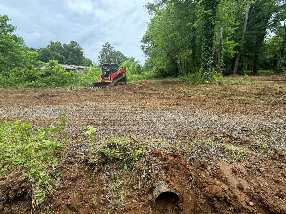 Our Land Clearing & Demolition service efficiently prepares your site for new projects, ensuring safe and thorough removal of debris, trees, and structures to create a clean slate for construction. for Hann Land Development in Lindale, GA