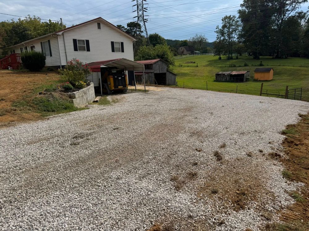 Our Gravel Work service expertly prepares and levels your property, ensuring a solid foundation for driveways or pathways, enhancing both accessibility and aesthetic appeal for your home landscape projects. for S&M DIRT TECH LLC in Knoxville, TN