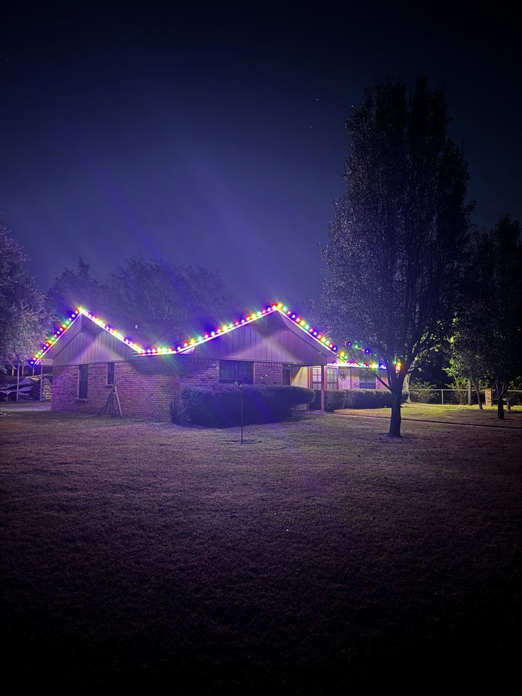 Illuminate your home with joy this holiday season by entrusting our Christmas light installation service. Let us bring the magic of Christmas trees to your house with professional care for a festive display. for Keener's Lawn and Landscape LLC in Quitman, TX