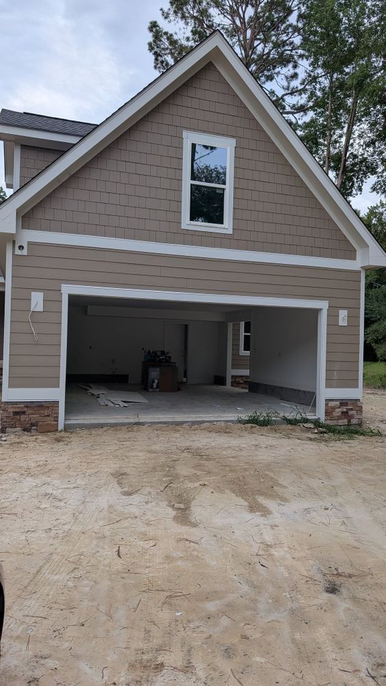 Our Custom Home Design service collaborates closely with homeowners to create personalized, innovative, and functional living spaces that perfectly reflect individual styles and needs, ensuring a seamless new construction experience. for Batchelor Construction in Wallace, NC