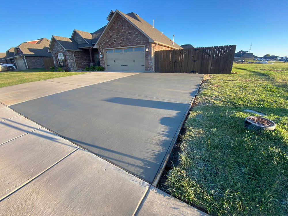 Enhance your home's curb appeal and durability with our expert driveway installation, complemented by top-quality roof seal protection to ensure longevity and resistance against weather damage. Contact us for premium concrete solutions today. for Apex Contractors LLC in Fayetteville, AR