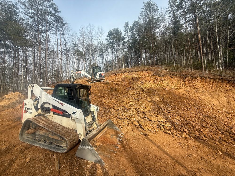 Our Building Site Grading and Prep service ensures your project starts right by providing expert land clearing, leveling the terrain, and preparing a stable foundation for seamless construction from the ground up. for Dutch Mountain Excavating in Sevierville, TN