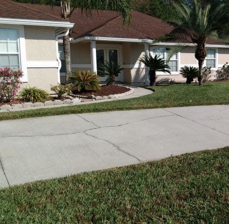 Enhance your garden's beauty and health with our mulch installation service. We apply high-quality mulch to retain soil moisture, suppress weeds, and enrich the appearance of your landscape effortlessly. for Tugger and Son's Lawn Care in Jacksonville, FL