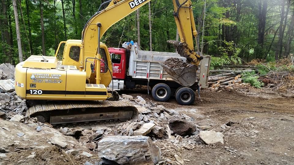 Our Skid Steer Work service offers efficient and precise excavation for residential projects, including landscaping, grading, and debris removal. We ensure your property is expertly maintained with minimal disruption. for Forever Green Landscaping & Excavation in Poultney, VT