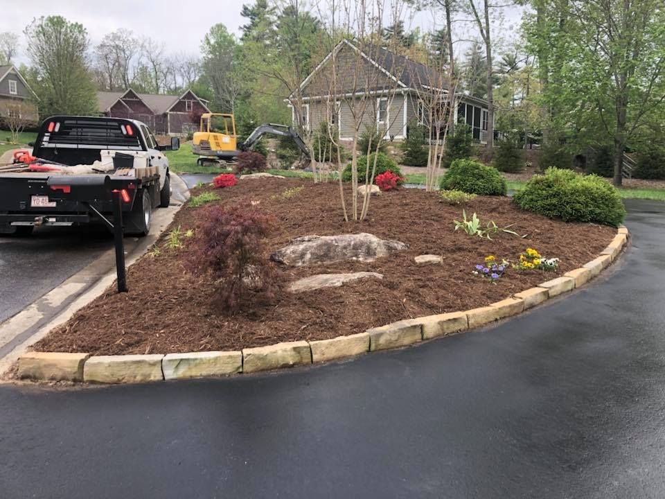 Enhance your landscape with our professional mulch installation service, providing nutrient-rich protection for your trees while improving soil health and moisture retention, all designed to elevate curb appeal in any season. for Andy's Tree Service in Zirconia, NC