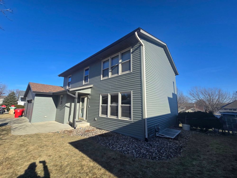 Enhance your home's energy efficiency and curb appeal with our expert window replacement service. Our skilled team specializes in installing high-quality windows and doors tailored to meet your design preferences. for Omega Construction LLC in Rochester, MN