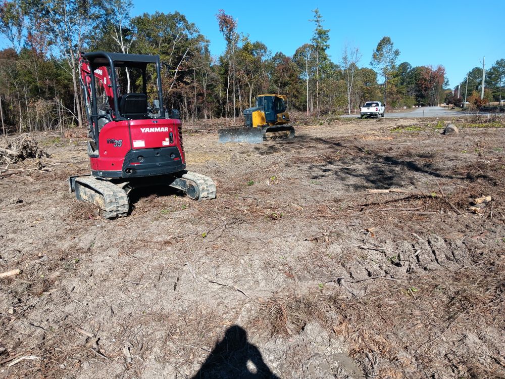 Our land clearing and site preparation service ensures your property is ready for development by efficiently removing obstacles and leveling the terrain, creating a perfect foundation for your septic system installation. for Forrest Plumbing and Septic Service LLC in Summerville, GA