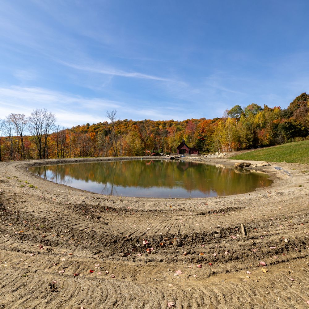 Carving a Pond into a Mountain Side for Andy Naylor Excavation in Stowe, VT