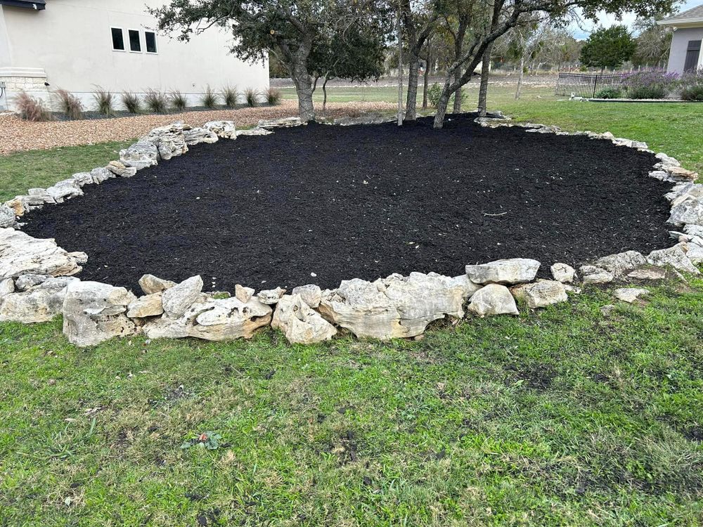 Our Mulch Installation service provides homeowners with professional assistance in spreading mulch to protect their garden beds, improve soil health, and enhance the overall aesthetic appeal of their property. for C & C Lawn Care and Maintenance in New Braunfels, TX