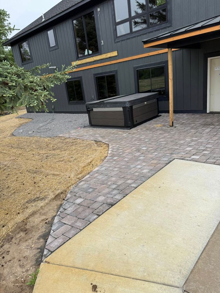 Enhance your outdoor living with our Patio Design & Construction service, offering customized solutions to transform your backyard into a beautiful, functional space perfect for relaxation and entertaining. for J’s Snow and Landscape in Oak Park, MN