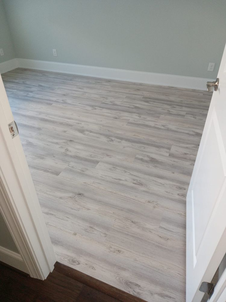 Transform the look and feel of your home with our high-quality flooring service. From hardwood to laminate, we offer a wide range of options to suit your style and budget. for Reel Renovations in  Holly Ridge, NC