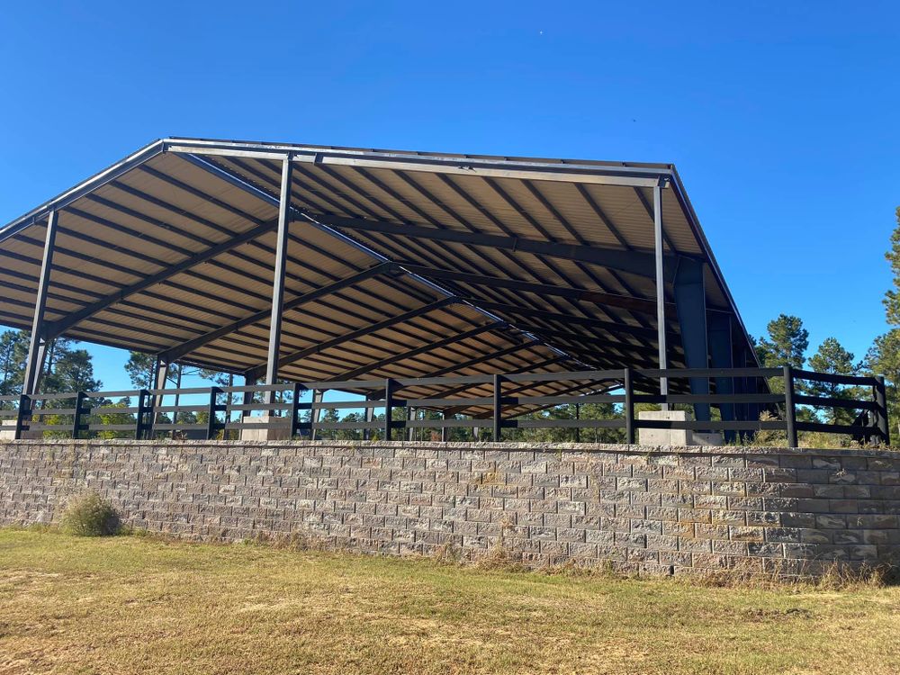 Our Metal Structures and Sheds service offers durable, customizable solutions that enhance your property with premium materials and expert craftsmanship, ensuring long-lasting protection for your storage needs or outdoor living space. for T & C Metal Builders in Northeast, TX