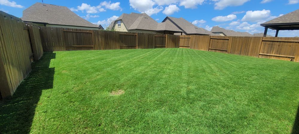 Our Lawn Care and Maintenance service enhances your home's curb appeal by ensuring a lush, healthy lawn through expert mowing, fertilization, weed control, and seasonal clean-ups tailored to your needs. for Texican JLS in Manor, TX