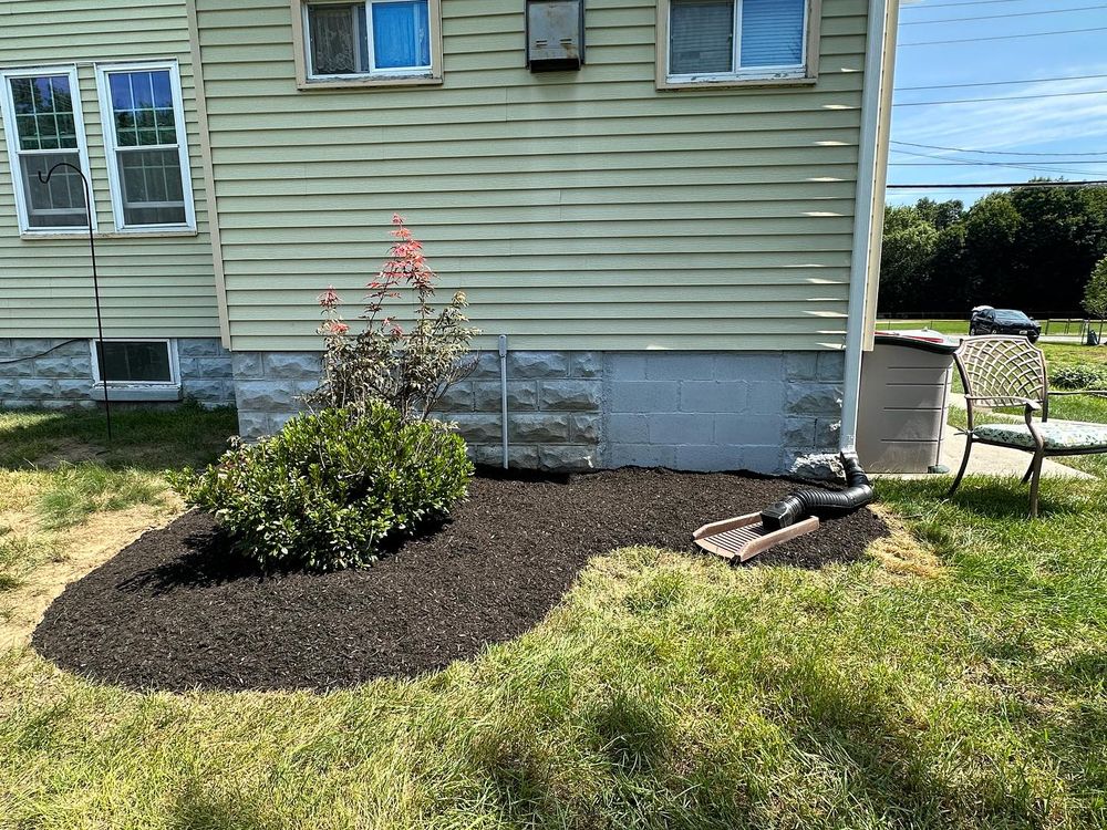 Our Planting Services offer expert assistance in selecting and planting beautiful flowers, trees, and shrubs to enhance your outdoor space. Let us bring new life to your garden today! for Garduno Landscaping LLC in Cumberland, RI