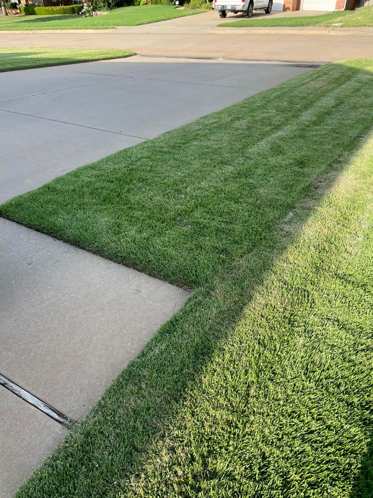 Our professional mowing service will keep your lawn looking pristine and well-maintained all season long. Trust us to provide reliable and efficient services for a beautiful outdoor space. for Divine Landscaping Services  in Stillwater, OK