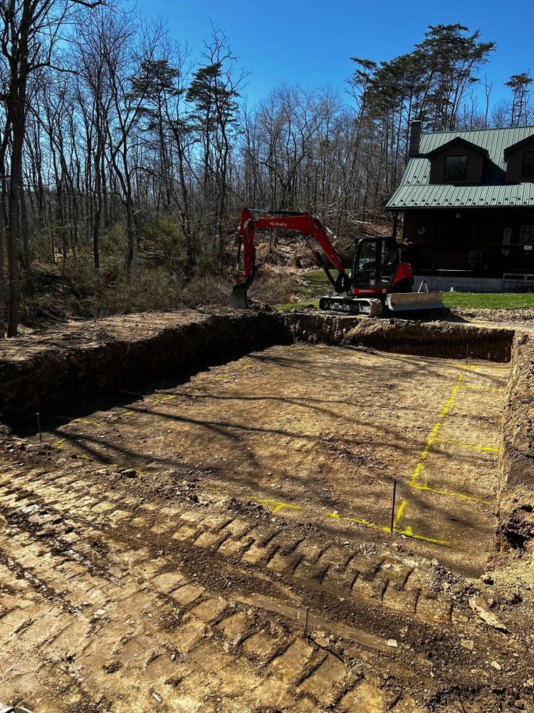 Our expert excavating contractor provides comprehensive residential and commercial excavation services. We ensure precision digging for foundations or landscaping projects while prioritizing safety and efficiency to transform your property's vision into reality. for Pine Mountain Restoration, LLC Excavation and Fencing Contractor in Howard, PA