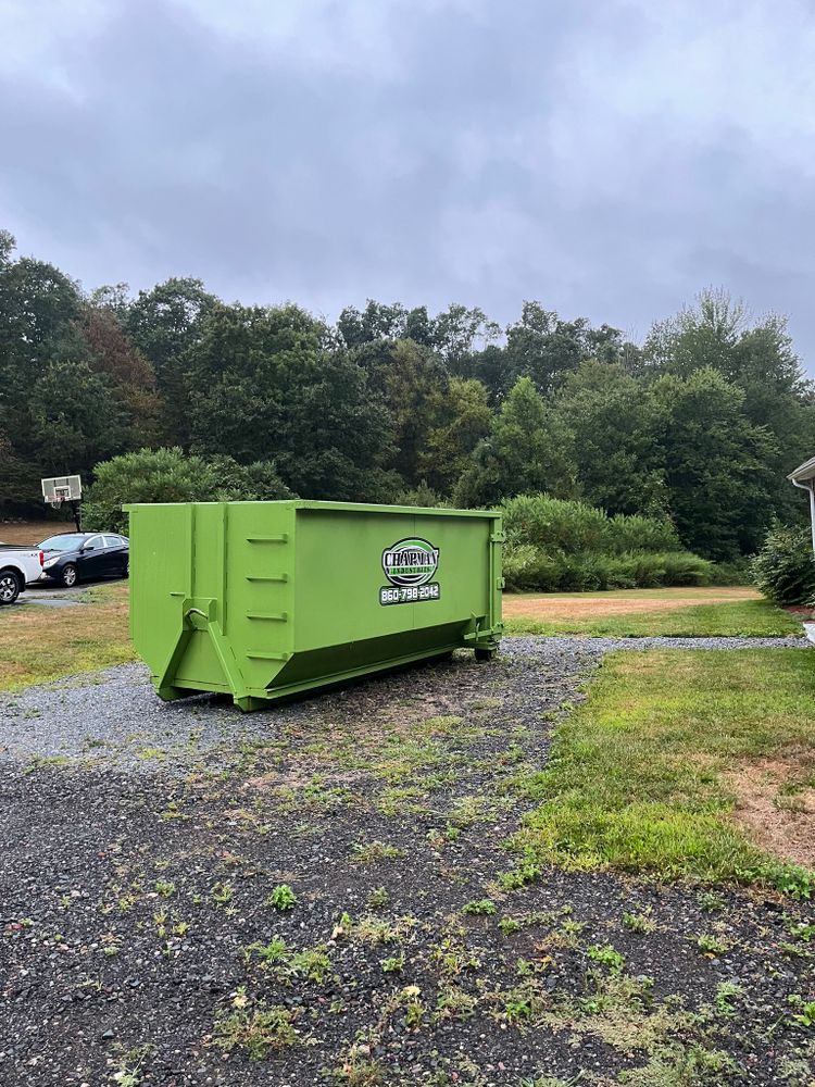 Our Twenty Yard Dumpster Rental service offers homeowners a convenient and affordable solution for managing medium-sized renovation, landscaping, or cleanout projects, ensuring efficient waste removal with hassle-free delivery and pickup. for Chapman Industries LLC in Ellington, CT