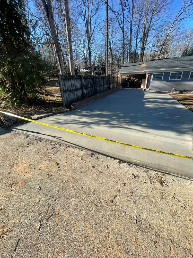 Enhance your home's curb appeal with our professional driveway construction service. Our expert team ensures durable, attractive concrete driveways that withstand weather and traffic, providing a lasting investment in your property's value. for Wenkel Concrete, LLC in Sherrills Ford, NC