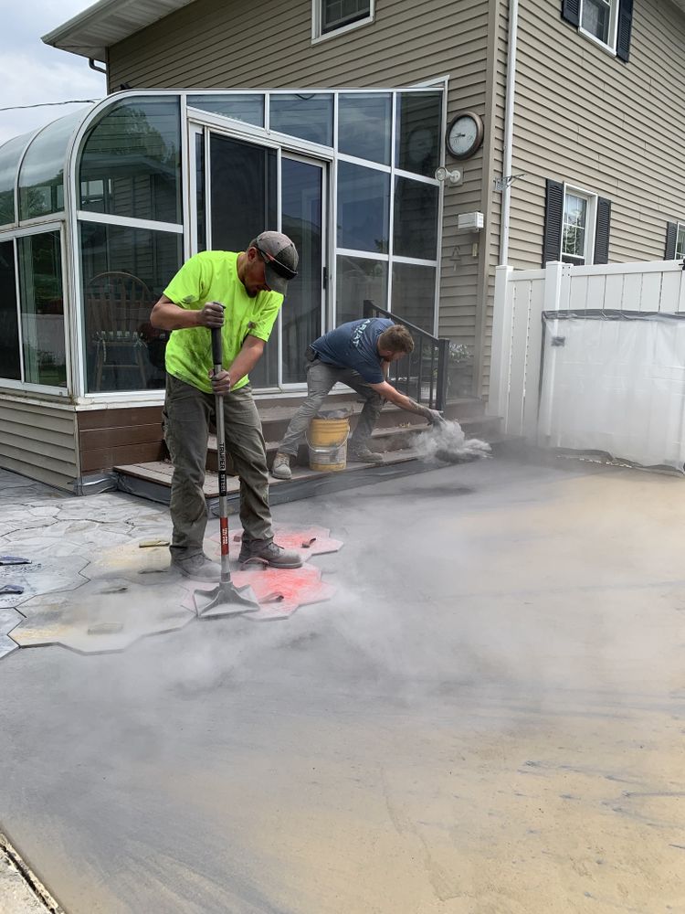 Transform your outdoor space with our expert stamped concrete installation, offering beautiful, durable designs that mimic natural stone at a fraction of the cost. Enhance your home’s curb appeal effortlessly. for Donahue Concrete in Streator, IL