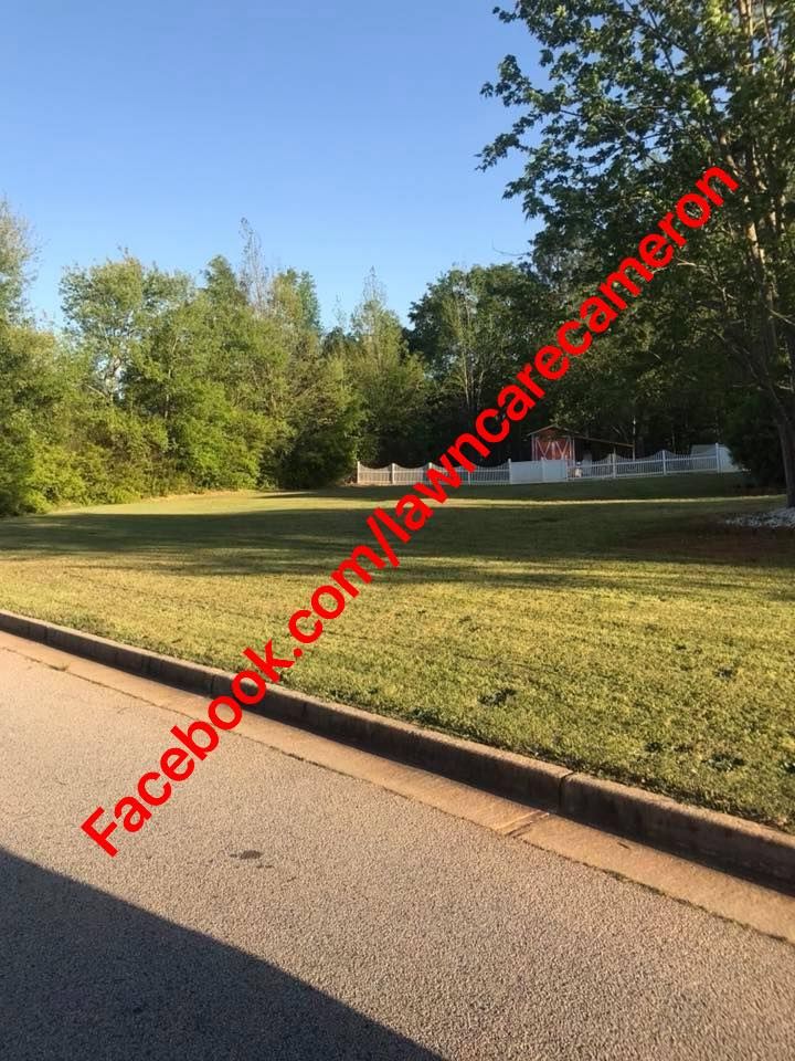 Enhance your home's curb appeal with our comprehensive Lawn Maintenance and Landscaping service, offering expert care, detailed design, and innovative solutions to transform your outdoor space into a beautiful oasis. for Cameron's General Services in Mansfield, GA