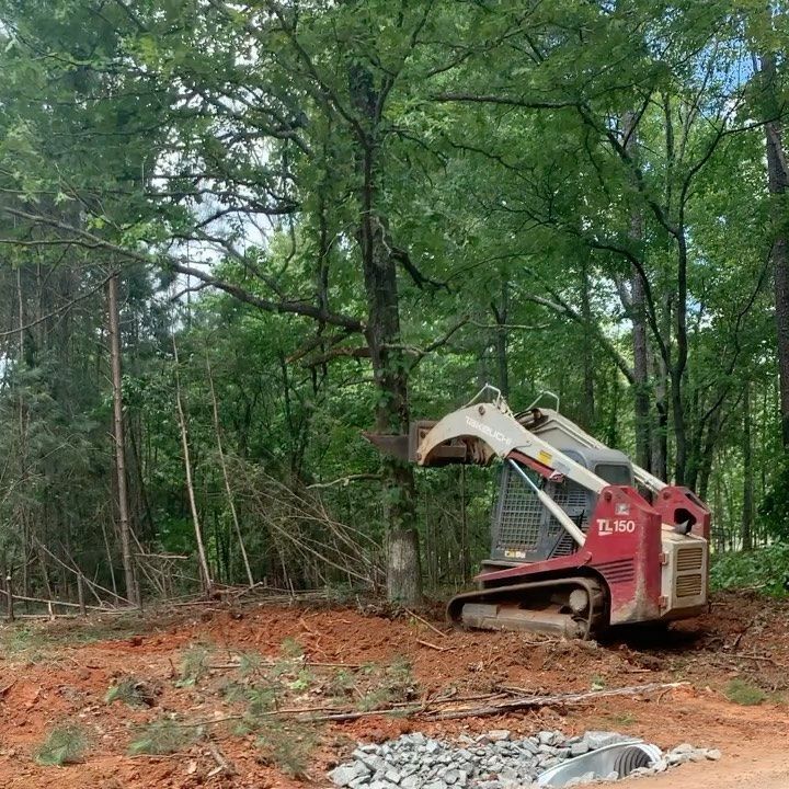 Our Land Grading service expertly levels and prepares your property for concrete projects, ensuring a solid foundation that enhances drainage and prevents future issues, all tailored to meet your specific needs. for Arsa Contracting LLC in Dallas, GA