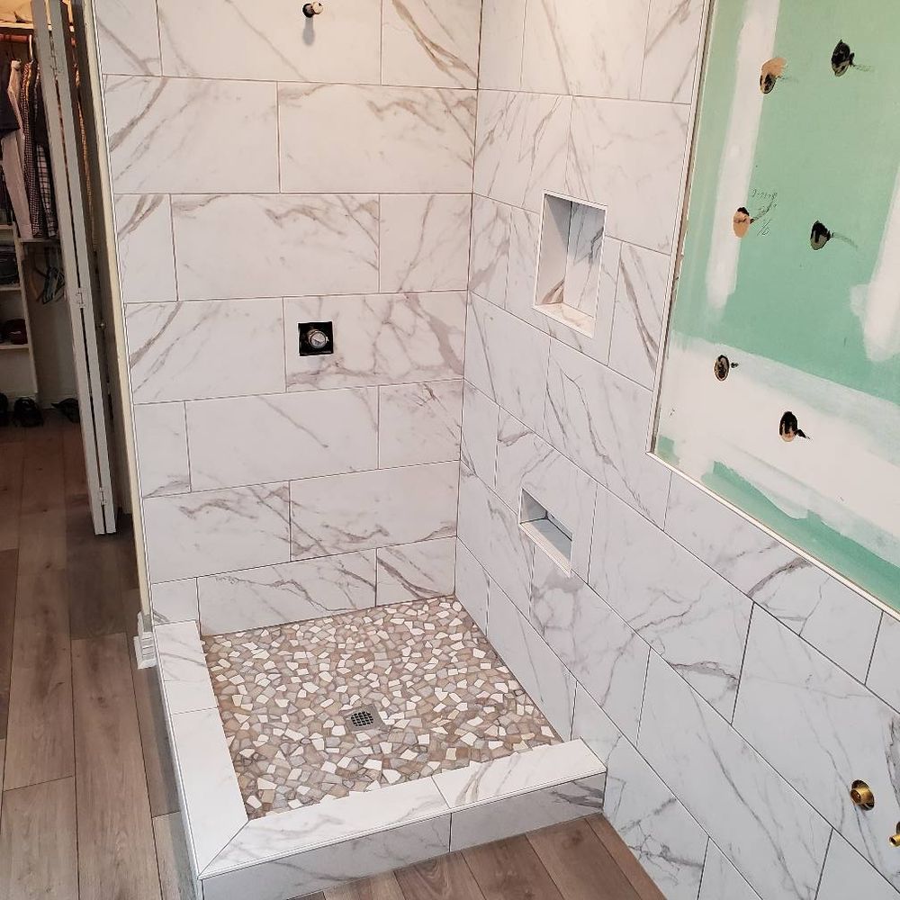 Our Bathroom Remodel service transforms your outdated bathroom into a modern oasis with stylish tile flooring options, expert installation, and personalized design assistance to elevate your home's aesthetic and functionality. for D&J Custom Floors in Nederland, TX