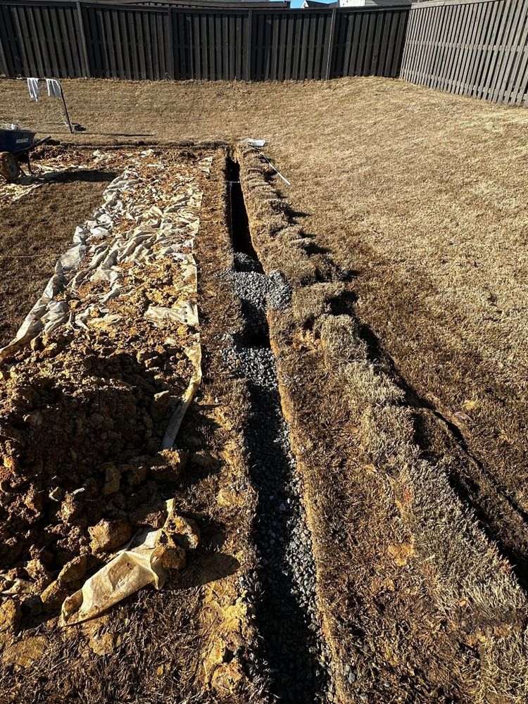 Our Drainage Systems service protects your property from water damage by directing runoff away from foundations, lawns, and hardscapes with smart, reliable solutions tailored to your site and landscape needs. for V&S Grading in Harlem, GA