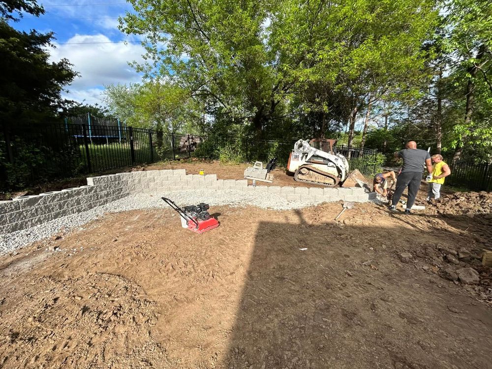Enhance your landscape with our expert retaining wall construction service, ensuring durability and aesthetic appeal. Trust our concrete company to deliver structural integrity and beauty for your outdoor spaces. for Steadfast Solutions in Columbia, MO