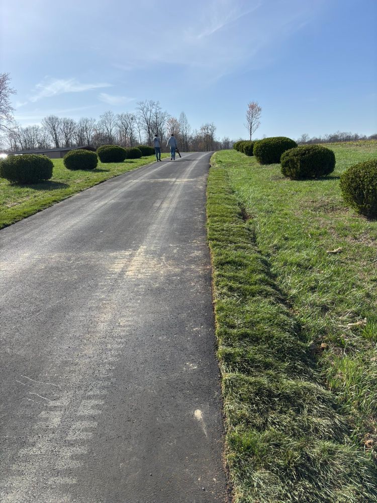 Our Edging and Pruning service focuses on shaping the boundaries of your landscape and enhancing the health of your plants by removing damaged or overgrown branches for a beautifully maintained property. for Great American Landworks  in Morrison, TN