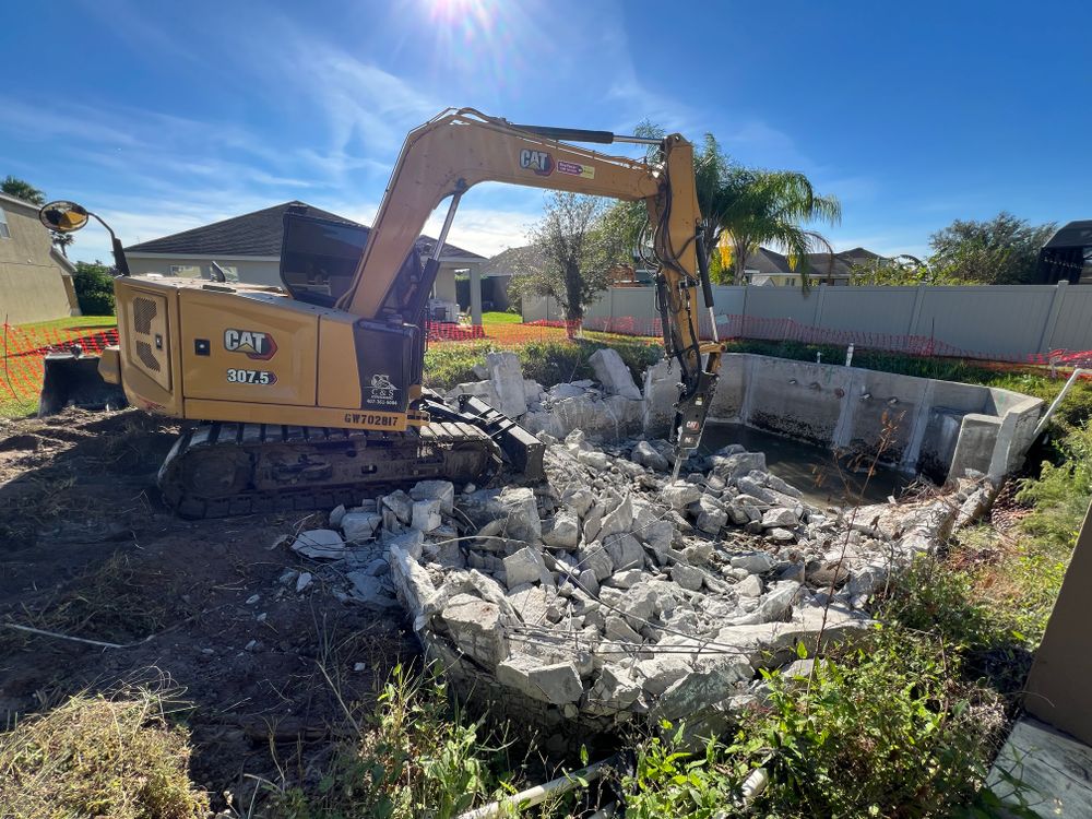 Our debris removal service helps homeowners clear their yards of rocks and trash to prepare for tree removal service, ensuring a clean and safe environment post-tree removal. for C & S Grading in Saint Cloud, FL