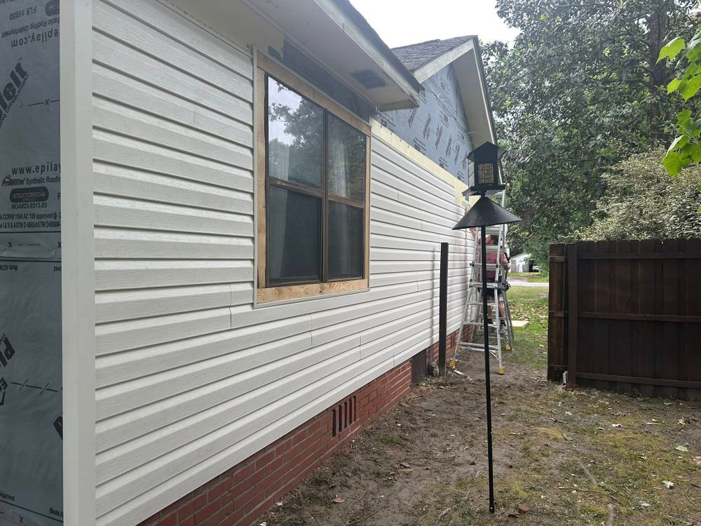 Enhance your home's exterior with our expert vinyl siding services, offering durability and energy efficiency while providing a beautiful, low-maintenance finish that complements your roofing for a cohesive look. for SEC Roofing and Siding in Pooler, GA