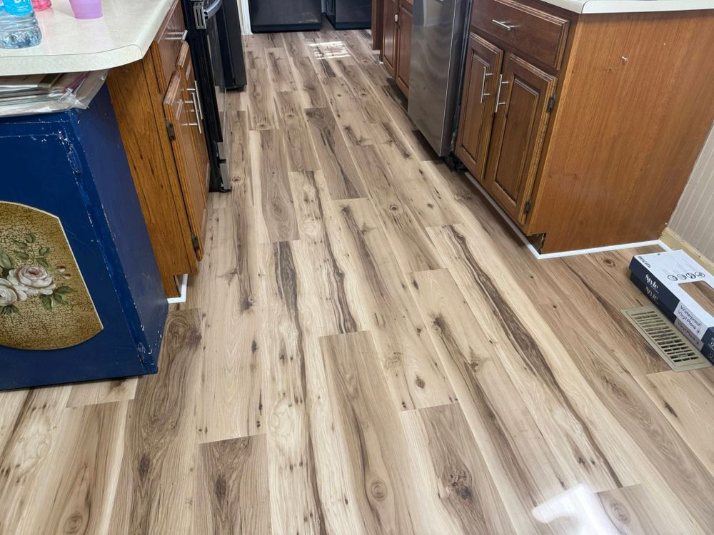 Transform your home with our expert flooring services. We offer high-quality hardwood, tile, and carpet installations designed to enhance beauty and durability, ensuring a perfect fit for your style and needs. for Southside Construction LLC in Chesnee, SC