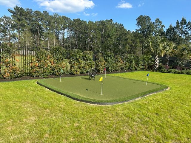 Enhance your backyard with our custom putting green service, offering a perfect blend of leisure and practice. Enjoy year-round golfing right at home with top-quality turf and professional installation. for Out Back Pool and Spa Creations in The Woodlands, TX