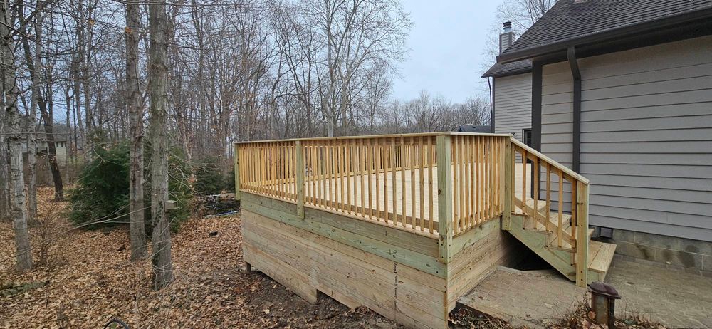 Transform your outdoor living space with our expert Deck and Patio Construction service. We design and build customized decks and patios to enhance the beauty and functionality of your home exterior. for Crossbones Contracting in Greencastle,  IN