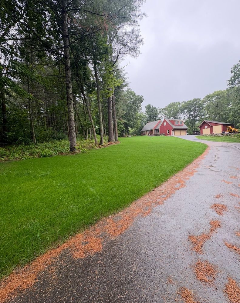 Our mowing service expertly maintains your lawn's health and appearance, offering precision cutting, edging, and clean-up to ensure a beautiful and well-manicured yard all season long. for Chapman's Lawn & Landscape in Ellington, CT