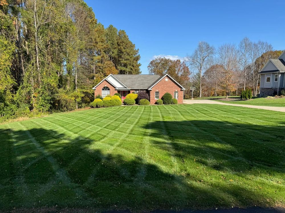 Our Seasonal Lawn Maintenance & Treatment service ensures a lush, healthy lawn year-round with expert care and mowing services tailored to each season, enhancing your home’s landscape beautifully and sustainably. for CW Lawn & Landscape in Hickory, NC