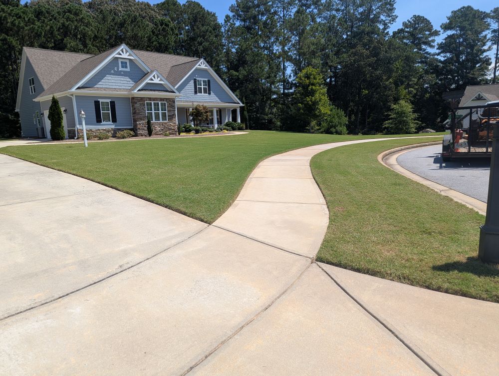 Our edging service is the perfect way to define your landscaping beds and separate them from lawn areas. We use a professional-grade edger to create a crisp, clean edge that will last all season long. for Fantastic Lawn Care in Fayetteville, GA