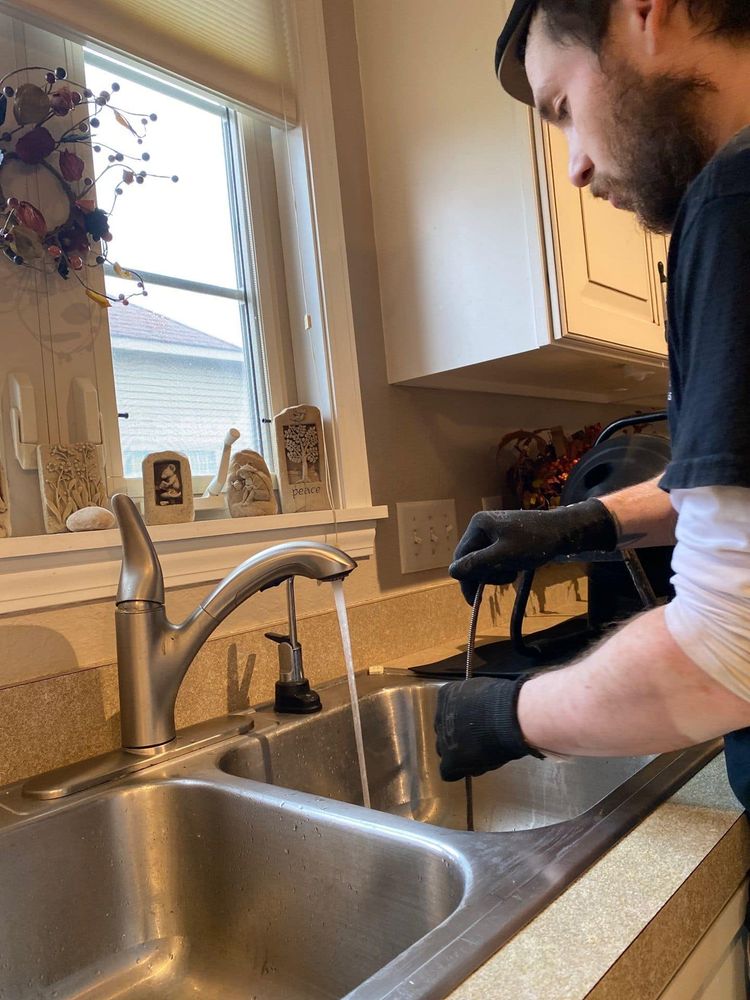 Top Notch Plumbing and Drain Cleaning team in Grand Rapids, OH - people or person