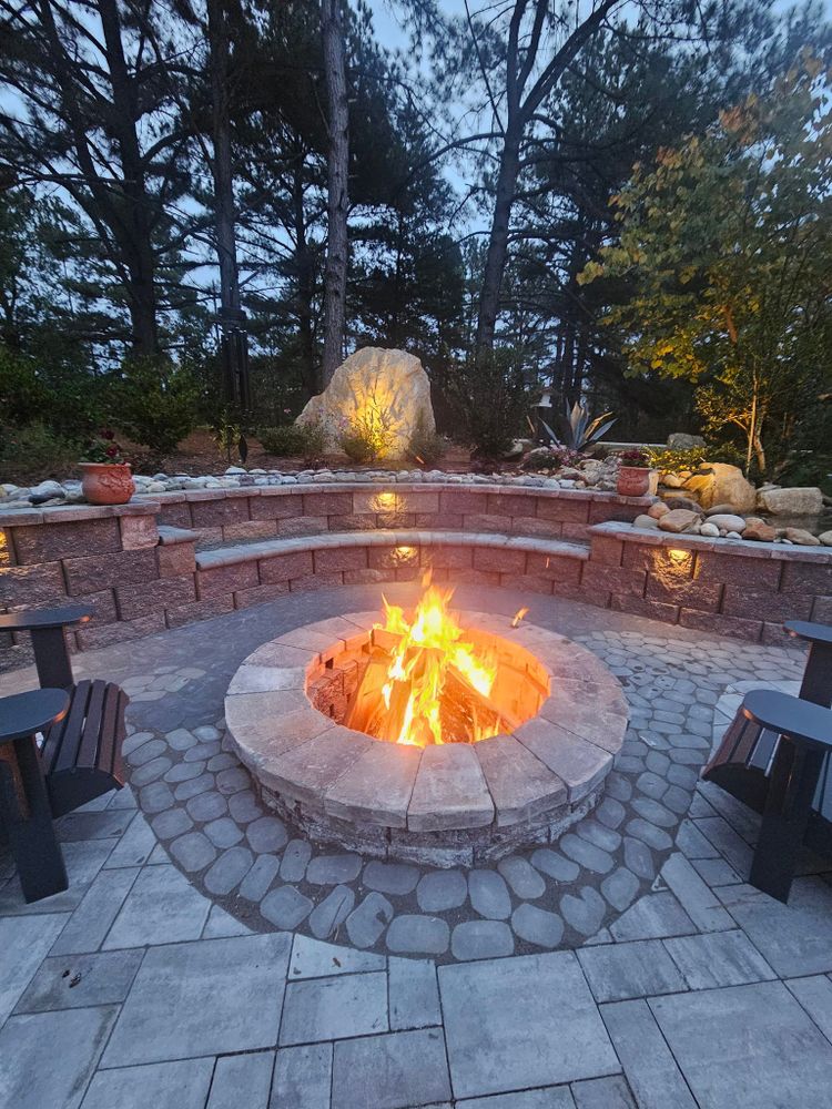 Enhance your outdoor space with our expertly crafted firepits. Our outdoor wood projects provide warmth and ambiance while blending seamlessly into your landscaping for a cozy and inviting backyard retreat. for RA Lawn Care, Landscape & Hardscape in Littleton, NC