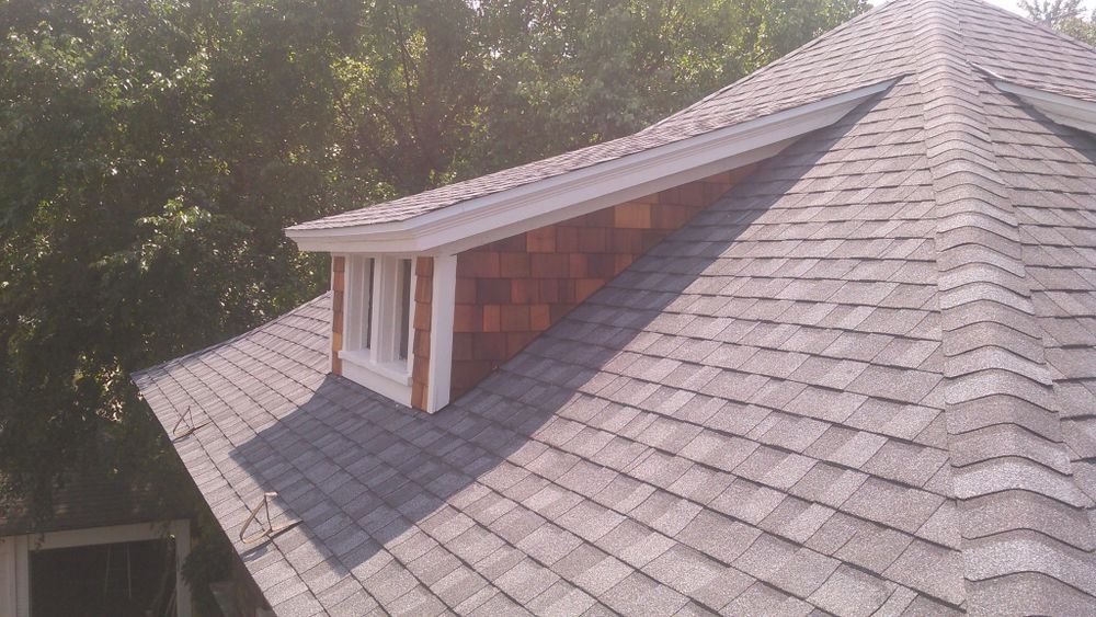 Our professional Roofing Installation service ensures a secure and durable roof for your home, providing expert craftsmanship, high-quality materials, and exceptional customer satisfaction with every project. for Squids Roofing Inc in Cutlerville, MI