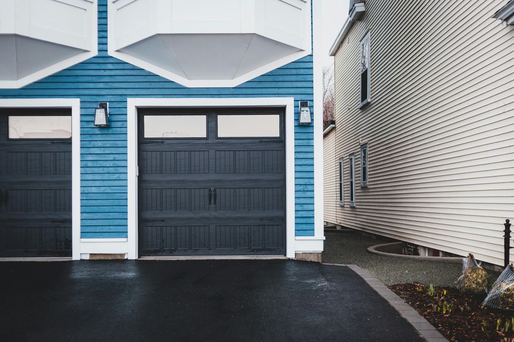 Enhance your home's curb appeal with our expert garage door painting and staining service, designed to provide a durable and attractive finish that withstands the elements while beautifully complementing your exterior. for Champs Fencing in Dallas, TX