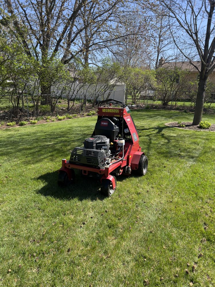 Enhance your lawn's health with our aeration services, designed to improve soil compaction and increase nutrient absorption, allowing grass roots to breathe and thrive for a lush, green landscape. for Luke's Lawn Care and Landscape in Andover, MN