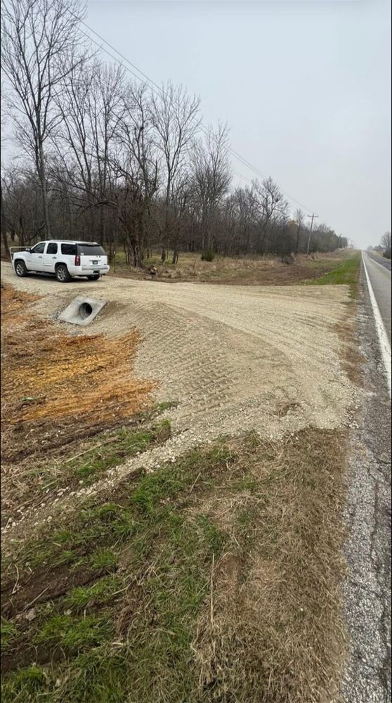 Our Driveway Construction service ensures durable and attractive solutions with expert gravel driveway maintenance, enhancing your home's curb appeal while maintaining functionality and longevity for years to come. for Iron Pine Land & Grading in Harris County,  GA