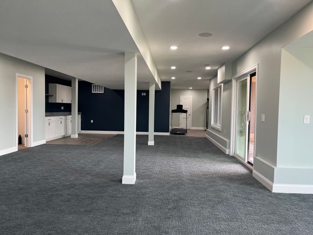 Transform your unused basement into a functional and comfortable living space with our expert Basement Finishing service. Increase the value of your home while adding extra square footage for relaxation or entertainment. for Compass Contracting LLC in Mentor, OH