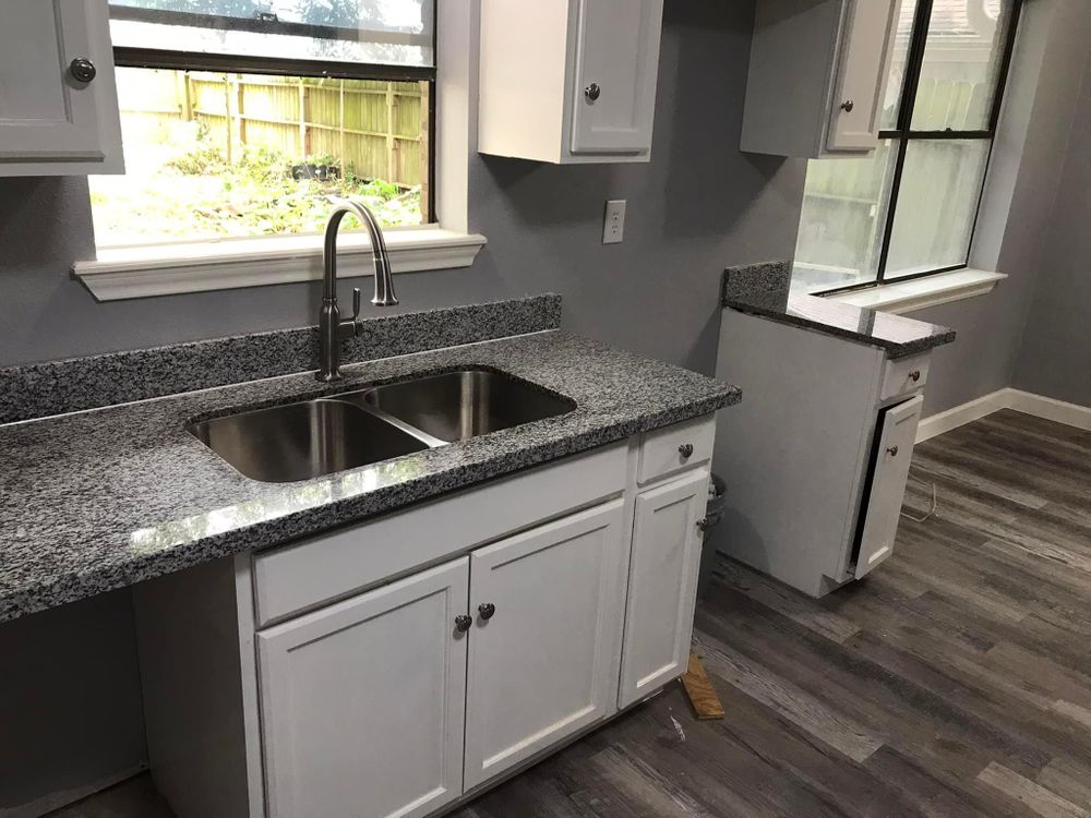 Our expert team offers comprehensive kitchen remodeling services to transform your space into the culinary oasis of your dreams. Trust us to handle every aspect of your project of granite or quartz countertops with care. for E & E Roofing in Baytown, TX